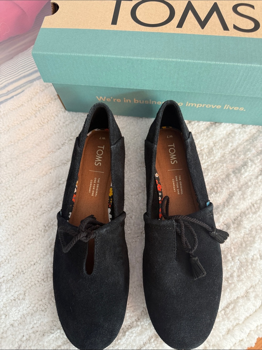 TOMS Black Suede Tassel Flats